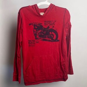 Red pullover hoodie with motorcycle club graphic.